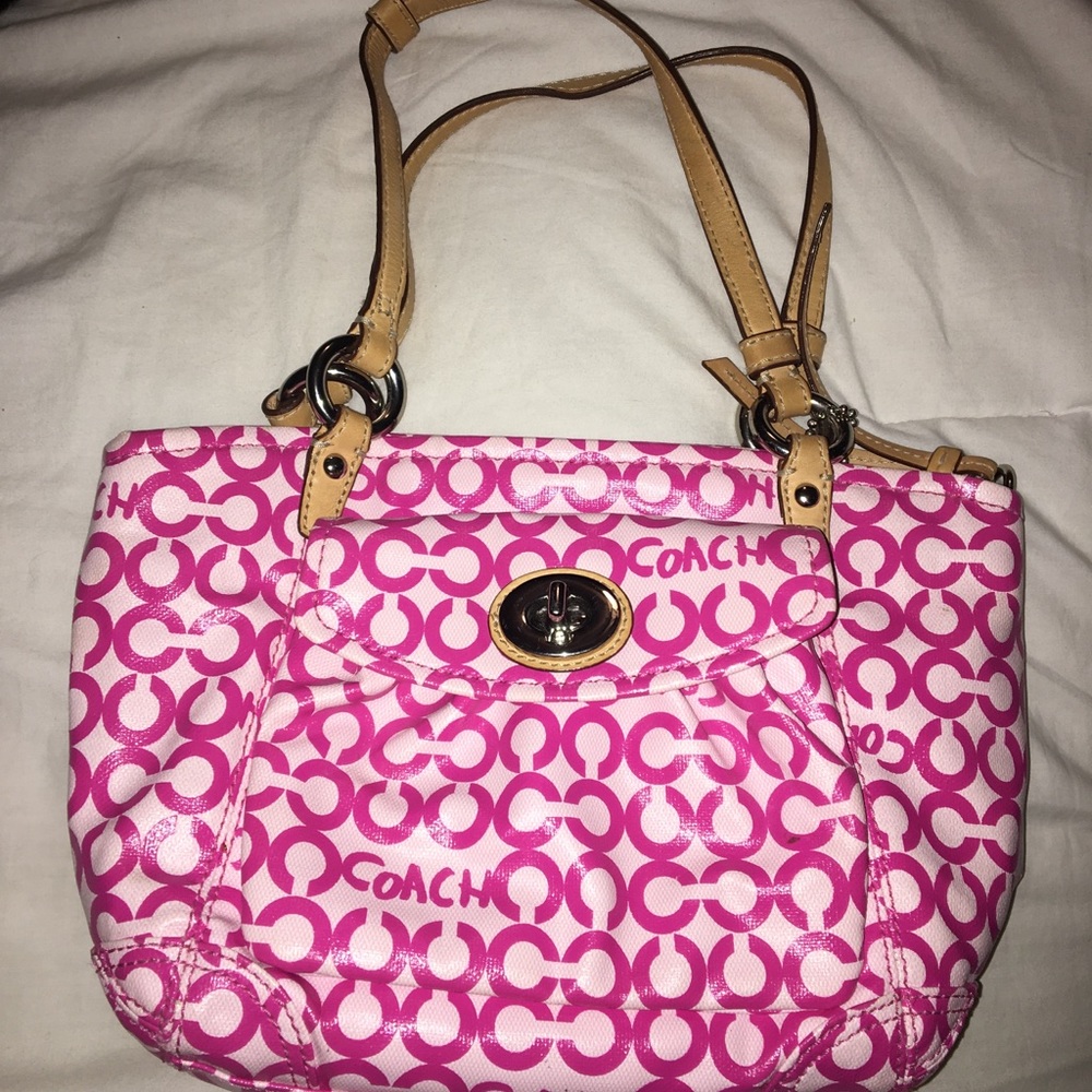 Small pink and white Coach purse